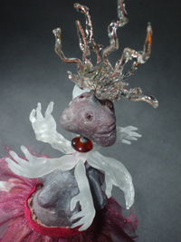 <div class='title'>Mother</div><br>flameworked glass, kiln-cast glass, mixed media<br>18"h x 14"w x 7"d<br>