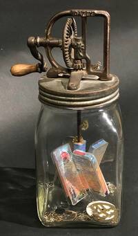 <div class='title'>Day Churns into Night</div><br>Vintage butter churner, acrylics, glass, watch parts<br>14"w x 8"h x 5.5"d<br>