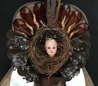 <div class='title'>Machinations</div><br>flameworked hands, guitar, seamstress tissue, sheet glass, mirror, vintage child's sewing machine, vintage wool shuttle, nest, bee hive, seeds, bundt pan, brass pins, watch-works, ruler, metal findings<br>43"h x 19"w x 12"d<br>